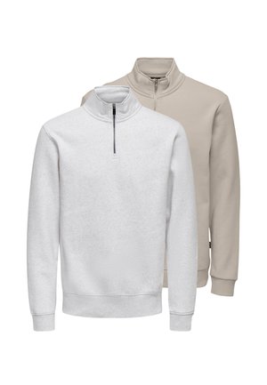 Dwie bluzy z kwadratowym zamkiem, jedna jasnoszara z przodu, druga beżowa z tyłu, obie z długimi rękawami oraz ściągaczami na mankietach i dole.