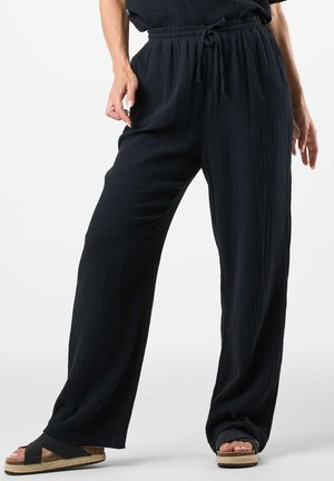MAXIME - Trousers - black