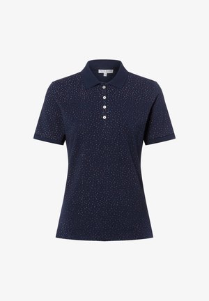 Polo bleu marine à manches courtes avec petits pois blancs et roses et quatre boutons blancs sur la patte de boutonnage.