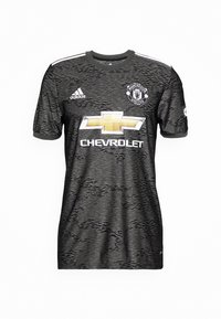 Musta ja harmaa Manchester United -paita, joka on valmistettu tekstuuriltaan erilaisesta kankaasta. Paidassa on pyöreä kaula-aukko, lyhyet hihat ja näkyvä Chevrolet-logo.
