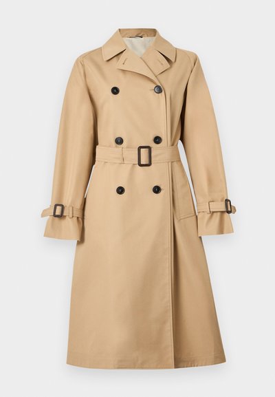 Μπεζ διπλόφτερος καπαρντίνα με φαρδιά γιακά, μαύρα κουμπιά, ζώνη στη μέση και ιμάντες με αγκράφα στις μανσέτες.