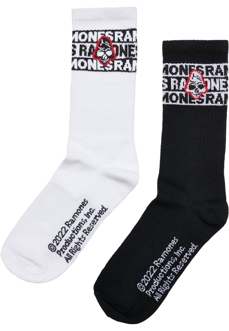 Schwarz-weiße Baumwollsocken mit gerippter Textur, versehen mit Logos in Schwarz und Weiß sowie roten Akzenten. Etiketten auf den Sohlen bedruckt.