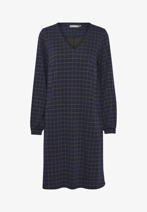 Mornarice plava haljina s V-izrezom, dugim rukavima i karičastim uzorkom u zelenoj boji. Napravljena od mekanog materijala s opuštenim krojem. Ima jednostavan dizajn.