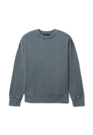 Felpa in cotone grigio sbiadito, girocollo, maniche lunghe, polsini e fondo a costine, vestibilità rilassata con dettagli di cucitura in vista.