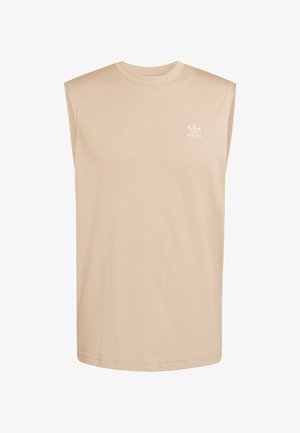Beige sleeveless t-shirt made from cotton, featuring a round neckline and a small white Adidas logo on the upper left chest.