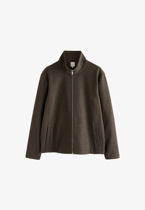 Ruda zip-up striukė su aukštu apykaklė, pagaminta iš tekstūruoto audinio. Su šoninėmis kišenėmis ir tiesiu siluetu.