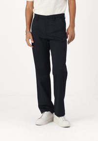 Dark navy trousers made from soft fabric, featuring a straight leg design, front pockets, and a button closure at the waist.