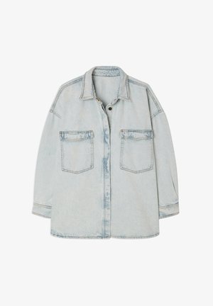 Light blue denim jacket with a button front, pointed collar, and two front pockets. Features a relaxed fit and faded texture.