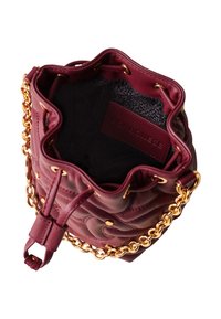 Small quilted burgundy leather bucket bag with gold chain strap and drawstring closure, showing patterned black interior and brand patch.