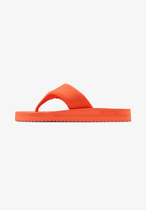 Orange flip-flop with a smooth upper strap, textured foam footbed, and a ridged outsole for traction. Brand logo embossed on side.