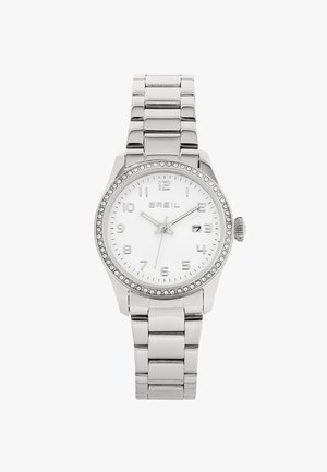 Montre-bracelet en métal argenté avec un cadran blanc, des marqueurs numériques et des accents en cristal sur la lunette. Bracelet en acier inoxydable avec une finition polie.