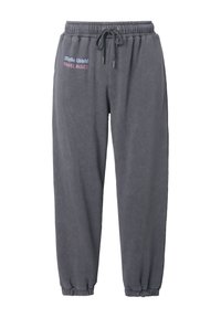 Donkergrijze sweatpants van een zachte stof, met een elastische tailleband, trekkoord en geribde boorden. Inclusief geborduurde merktekst.
