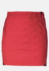 Tilkattu lyhyt hame kirkkaanpunaisena, jossa kuusikulmainen kuvio. Sivulla on vetoketjukiinnitys ja mukavuutta lisäävä sileä vyötärönauha.