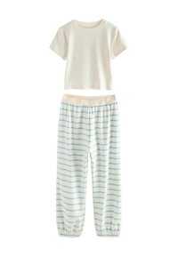Cotton loungewear set featuring a cream short-sleeve top and light blue striped pajama pants with an elastic waistband.