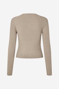 Ribots, garām piedurknēm tops neitrālā bēšā krāsā ar pieguļošu dizainu un apaļu kakla izgriezumu. Mīksta tekstūra ar bezšuvju pleciem.