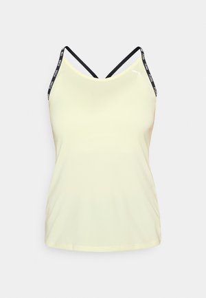 Light yellow tank top with black crossover straps featuring "PUMA" branding. Made of smooth fabric, it has a fitted design and hemmed edges.