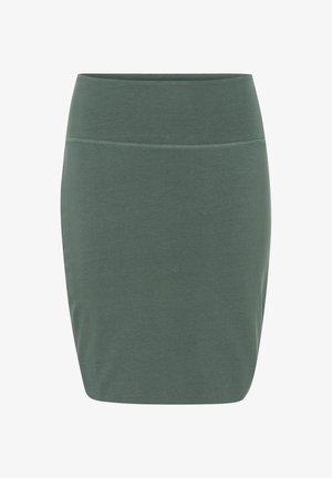 Jupe verte, longueur genou, fabriquée en tissu doux avec une taille élastique et un design simple et ajusté. Pas de motifs ni de détails supplémentaires.