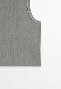 Grey ribbed sleeveless knit top with rounded armhole edge, laid flat on a white background.