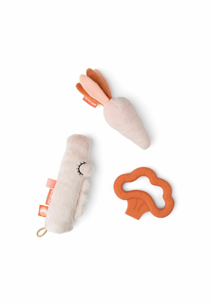 Three baby toys: a plush carrot in light pink and brown, a soft pink squeaky stick, and an orange silicone broccoli teether with textured detail.