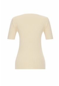 Top de manga corta con canalé en beige claro, con un diseño ajustado y una textura suave, que presenta un escote redondeado y hombros sin costuras.