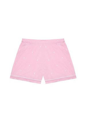 Pink cotton shorts with white polka dots, featuring an elastic waistband and white trim along the hem. Textured smooth finish.