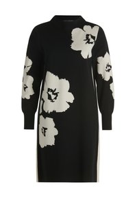 Czarna dzianinowa sukienka z długimi rękawami, z dużymi białymi kwiatowymi wzorami. Posiada wysoki dekolt i boczne rozcięcia dla swobody ruchów.