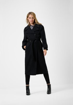 Cappotto nero lungo con bottoni doppi, ampi revers e una cintura di tessuto. Presenta due tasche laterali e un design fino al ginocchio.