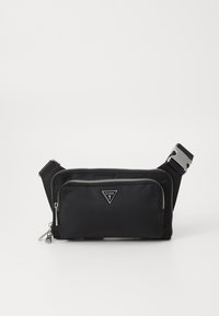 Riñonera negra de nailon con un cierre plateado, bolsillo frontal y logo triangular. Correa ajustable con hebilla metálica, textura suave.