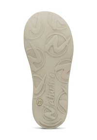 Gumová podrážka obuvy, oválný tvar, texturovaný povrch s opakujícím se logem, smetanová barva, vyražený název značky a velikost "20".