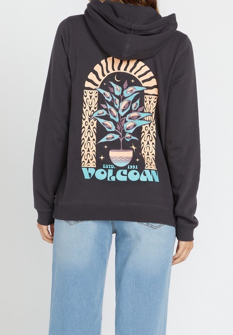 Sweat à capuche noir ornant un graphique coloré d'une plante en pot avec des yeux, encadré par un arc décoratif et le texte "VOLCOM" en bas.