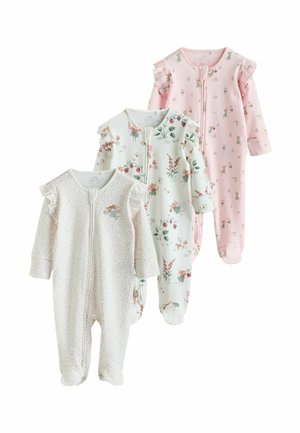 Tre babybodysuits med blomstermønster og flæser på skuldrene, én beige, én hvid og én lyserød, alle med lynlås foran og ben med fødder.