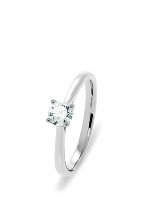 Solitärring aus poliertem Weißgold mit einem einzelnen runden, klaren Diamanten, gehalten von vier Krappen. Glatter, schlanker Ring mit reflektierendem Finish.