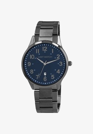 Silberne Edelstahl-Uhr mit einem dunkelblauen Ziffernblatt, großen weißen Stundenmarkierungen, Datumsanzeige und einem polierten Metallarmband.