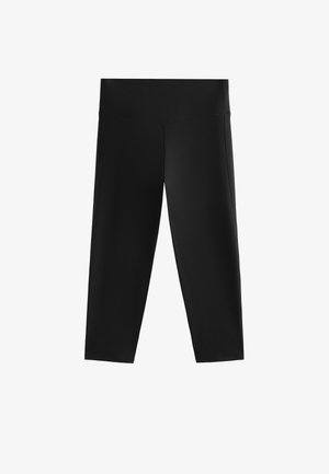 Mustat legginsit, joissa on sileä, joustava pinta, korkealla vyötäröllä ja lyhyt pituus, suunniteltu mukavuutta ja joustavuutta varten.