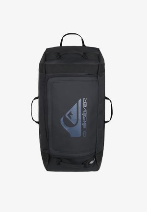 Black duffel bag made of durable fabric, featuring a large front pocket with a blue logo, two side handles, and reinforced stitching.