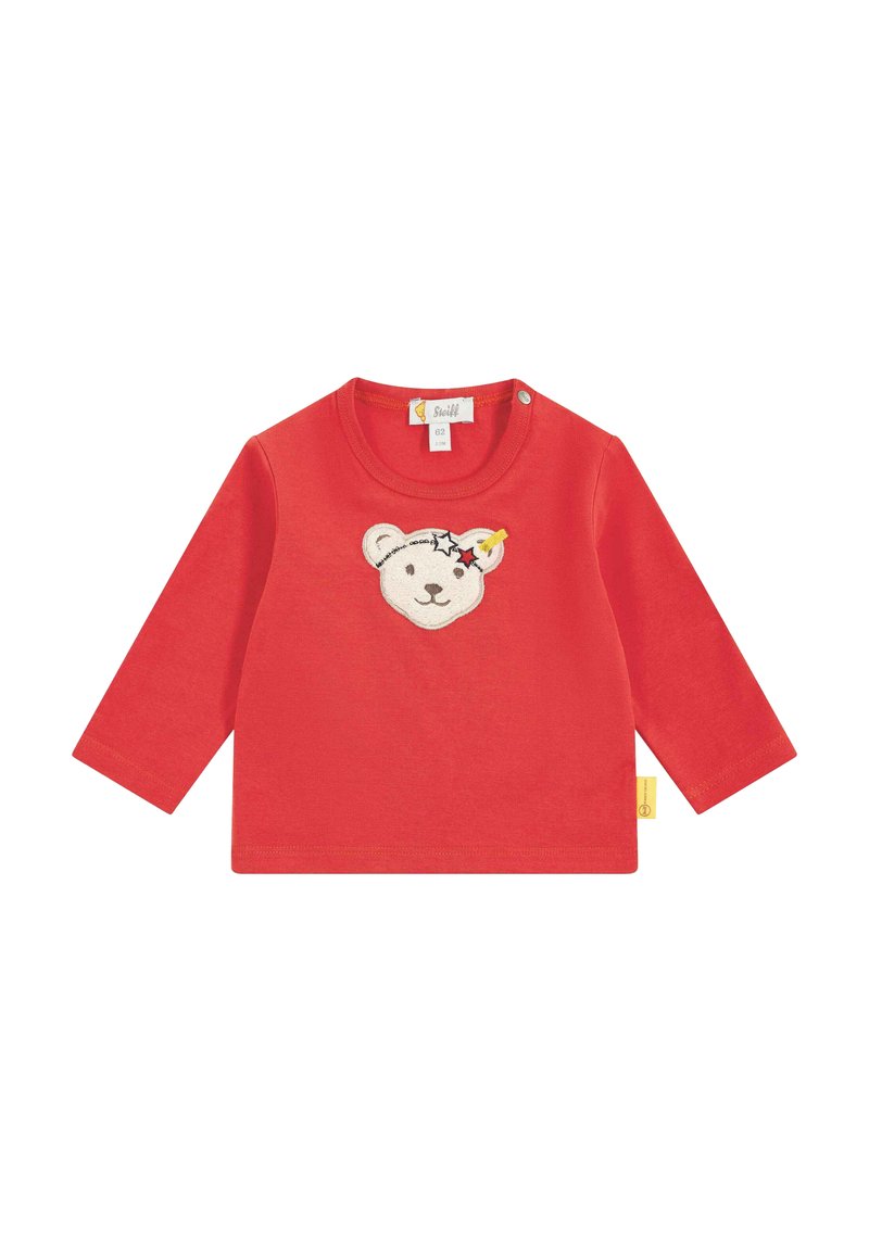 Rotes Langarmshirt aus Baumwolle mit einem gestickten Bärenkopf und Sternen. Mit Druckknopfverschluss an der Schulter.
