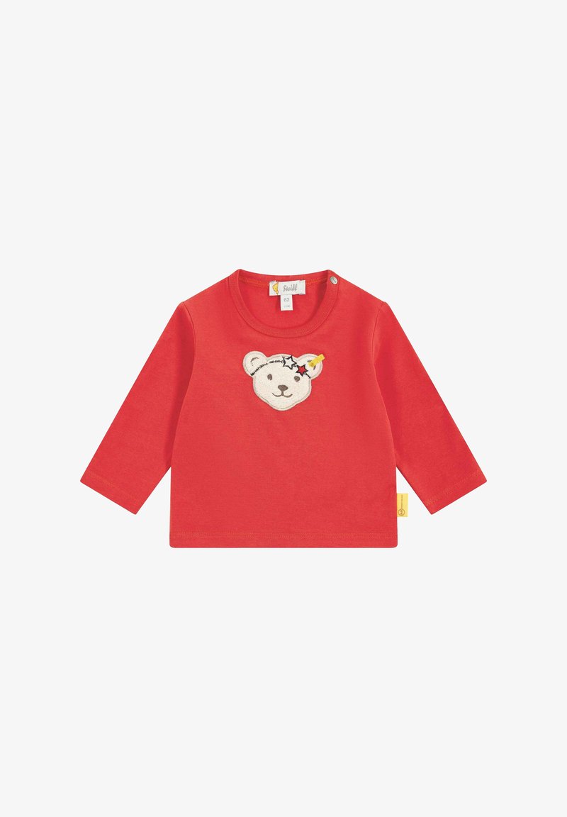 Rotes Langarmshirt aus Baumwolle mit einem gestickten Bärenkopf und Sternen. Mit Druckknopfverschluss an der Schulter.