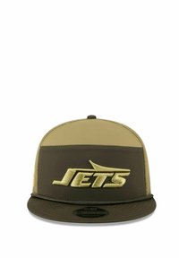 Snapback-Cap mit flachem Schild, olivgrüner Stoff, beigen Panels, mit aufgesticktem "JETS"-Logo in Gold. Strukturiertes Design mit verstellbarem Rücken.