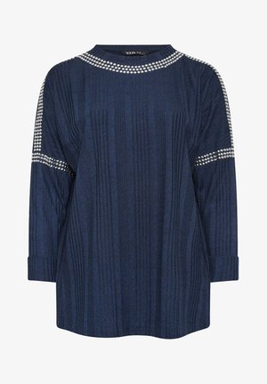 Tummansininen, pitkähihainen paita, jossa on ribatoitu pinta ja koristeellisia hopeisia niittejä hartioilla ja kaula-aukossa. Pehmeää kangasta, rento malli.