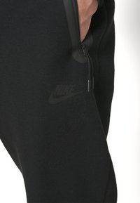Nike Sportswear TECH FLEECE OPEN HEM PANT - Träningsbyxor - black