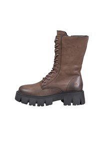 Brown leather ankle boot with a round toe, thick black rubber sole, and front lacing. Features a smooth finish and subtle side logo detail.