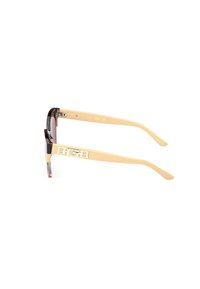 Guess Aurinkolasit - giallo-marrone