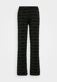 Aangesloten zwarte broek met een subtiel reliëf met een spiraalpatroon. Voorzien van een traditionele tailleband en een recht model. Zachte textuur, minimalistische stijl.
