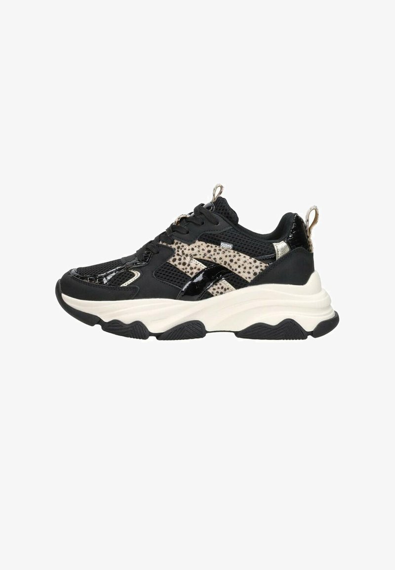 Black and beige sneaker with mesh and synthetic upper, raised sole, decorative patterns, and glossy accents. Features a pull tab on the heel.