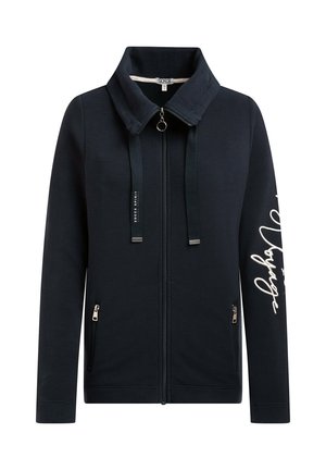 Navy zip-up jacket with high collar, drawstrings, zippered pockets, and white cursive text on the right sleeve.