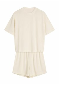 Cream-colored ribbed two-piece set featuring a short-sleeve top and mid-thigh length shorts with an elastic waistband.
