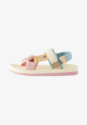 Hakken met banden in pastelroze, blauw en beige stof, een textuur voetbed en een rubberen zool. Verstelbare klittenbandsluitingen.