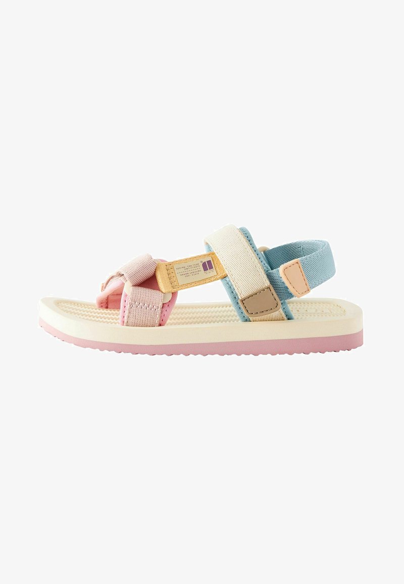 Strappy sandals featuring pastel pink, blue, and beige fabric, a textured footbed, and a rubber sole. Adjustable hook-and-loop straps.