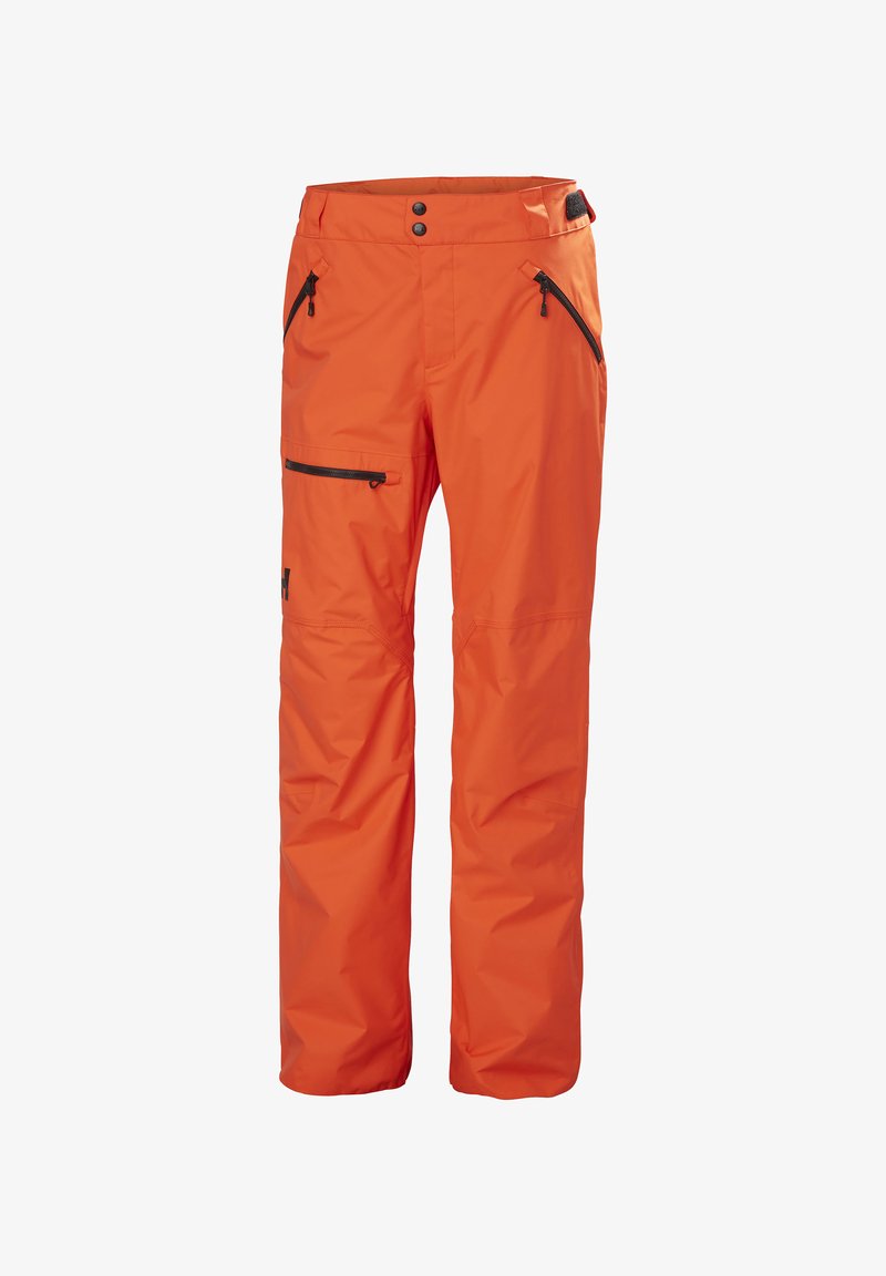 Oranje waterdichte sneeuwbroek met een gladde textuur, twee zijzakken met rits en een ritszak op de dij. Heeft een verstelbare tailleband.