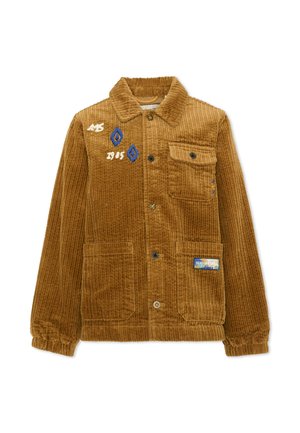 Bruine corduroy jas met knopen, drie voorzakken, geborduurde blauwe geometrische vormen, "1985" tekst en een merkpatch op de onderste zak.